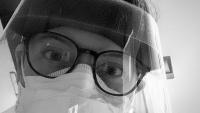 Close up of Erin Pratt wearing PPE.